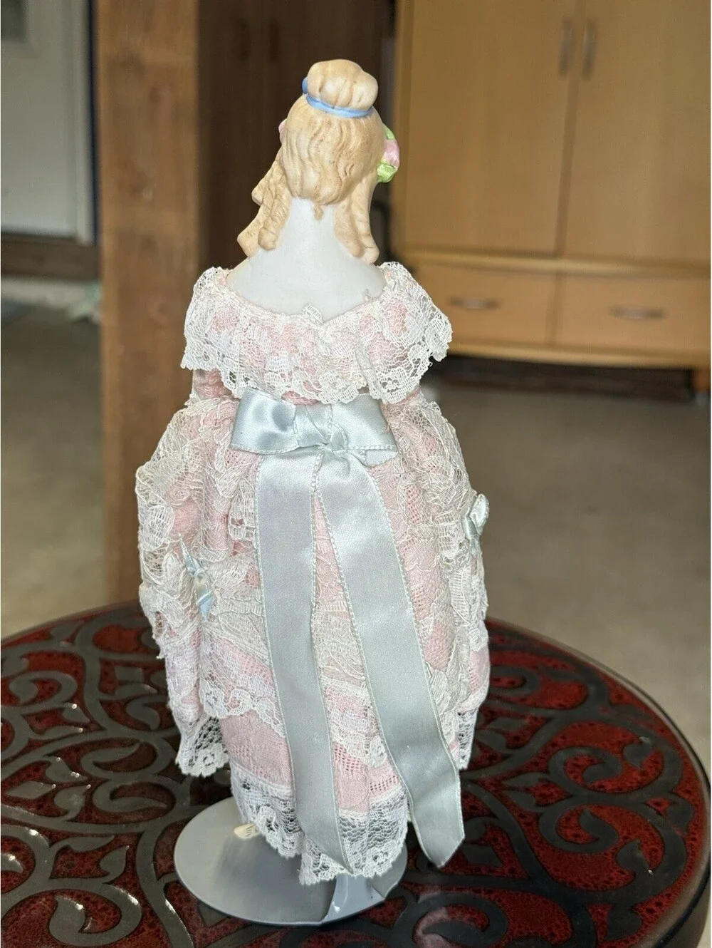 vtg porcelain doll Holding Flowers With Stand